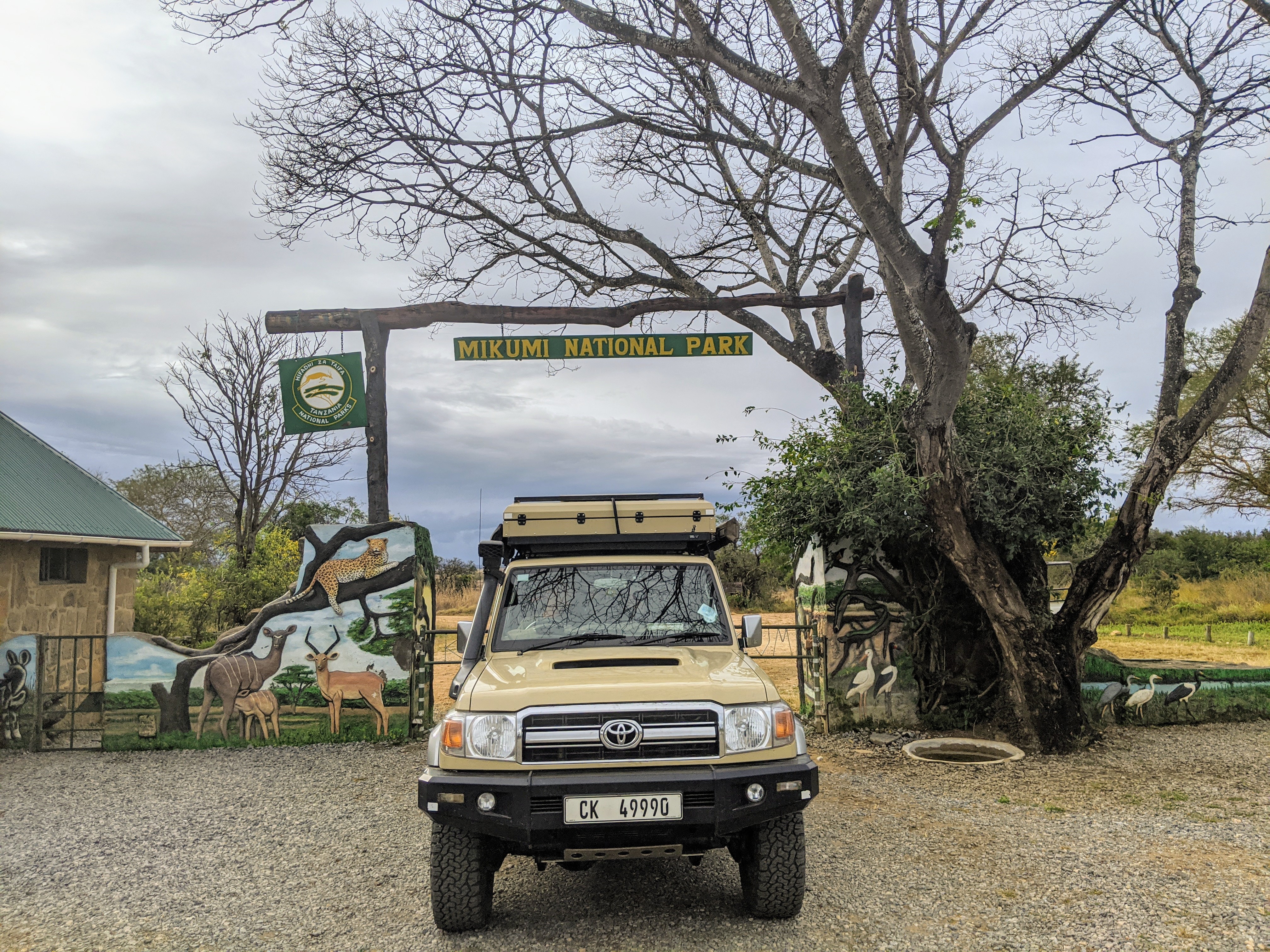 A land cruiser at the gate to mikumi National Park 