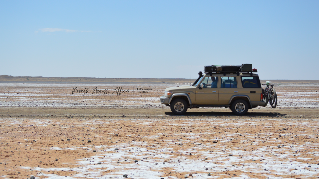 A land cruiser on open ground in Namibia 